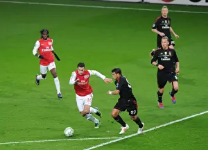 Arsenal's Van Persie and Gervinho Clash with AC Milan's Thiago Silva in 2012 Champions League Showdown