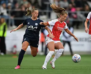 Linkoping FC V Arsenal Women 2023-24 Prints: Arsenal's Victoria Pelova Stands Firm Against Linkopings FC Opponent in UEFA Champions League Battle