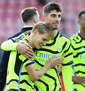 Arsenal's Victory: Martin Odegaard and Kai Havertz Celebrate at Vitality Stadium (AFC Bournemouth vs Arsenal, 2023-24)
