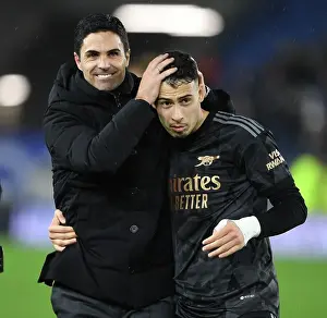 Arsenal's Victory: Arteta Celebrates with Martinelli vs. Brighton & Hove Albion (2022-23)