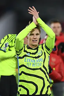 Brentford V Arsenal 2023-24 Prints: Arsenal's Victory at Brentford: Martin Odegaard Celebrates with Fans (2023-24)