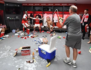 Arsenal's Victory Celebration: Vic Akers Sprays Champagne on Danny Welbeck and Granit Xhaka (FA Cup Final 2017)