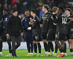 Arsenal's Victory Celebration: Arteta and Nketiah Rejoice after Beating Brighton in the Premier League 2022-23
