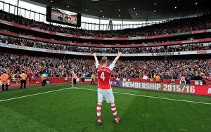 Arsenal v West Bromwich Albion 2014/15 Collection: Arsenal's Victory Celebration: Per Mertesacker Salutes the Faithful (2014/15)