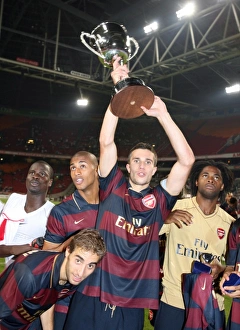 Arsenal's Victory Celebration: Robin van Persie, Mathieu Flamini, Armand Traore, and Alex Song