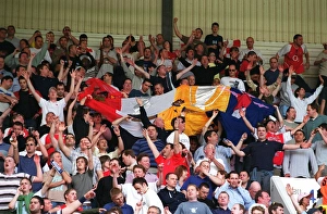 Arsenal's Victory: Fans Celebrate at White Hart Lane, 2004