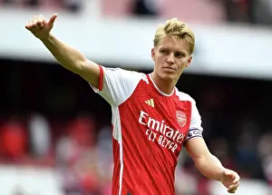Arsenal's Victory: Odegaard Acknowledges Fans After Arsenal v Nottingham Forest (2023-24)