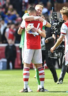 Images Dated 23rd April 2022: Arsenal's Victory: Ramsdale and Xhaka Celebrate Over Manchester United