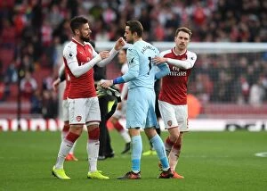 Images Dated 28th October 2017: Arsenal's Victory: Ramsey and Giroud Celebrate with Former Teams Goalkeeper Fabianski