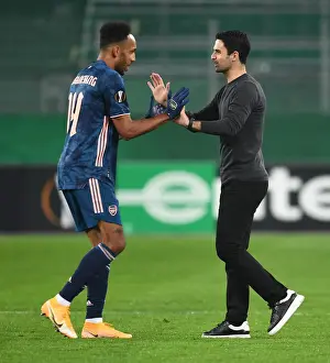 Arsenal's Victory in Vienna: Arteta and Aubameyang Celebrate Europa League Triumph over Rapid Wien