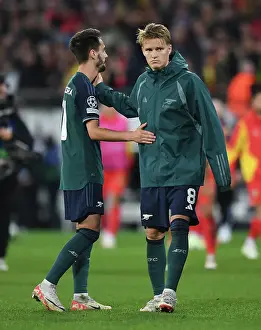 Arsenal's Vieira and Odegaard Celebrate after RC Lens Victory in 2023-24 UEFA Champions League