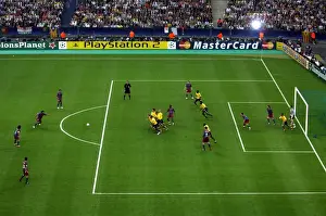 Classic Match Prints: Arsenals wall rushes to charge down Ronaldinho (Barca) shot
