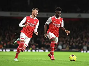 Arsenal V Newcastle United 2022-23 Prints: Arsenal's White and Saka in Action: Arsenal FC vs Newcastle United