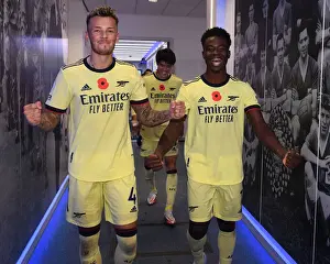 Arsenal's White and Saka Celebrate Victory Over Leicester City in 2021-22 Premier League