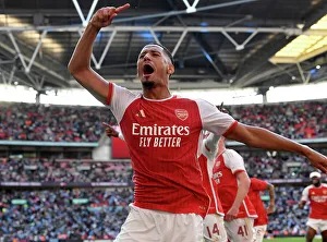 Arsenal V Manchester City - Community Shield 2023-24 Prints: Arsenal's William Saliba Celebrates Community Shield Victory Over Manchester City