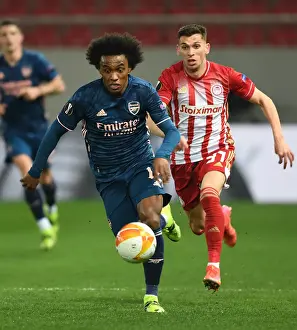 Olympiacos V Arsenal 2020-21 Prints: Arsenal's Willian Scores Past Olympiacos in Empty Europa League Stadium