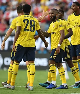 Arsenal's Willock and Lacazette Celebrate Goal in 2019 International Champions Cup, Charlotte