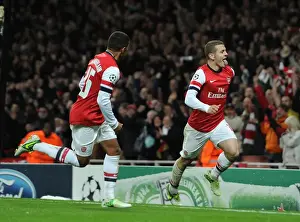 Arsenal V Montpellier 2012-13 Prints: Arsenal's Wilshere and Oxlade-Chamberlain: Celebrating a Goal Against Montpellier (2012-13)