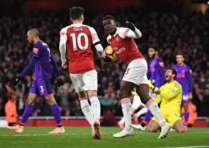 Arsenal's Winning Moment: Welbeck and Ozil Celebrate Goal vs. Liverpool (2018-19)
