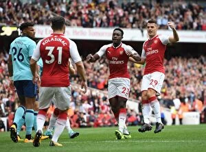 Arsenal v AFC Bournemouth 2017-18 Collection: Arsenal's Winning Moment: Welbeck, Xhaka, and Kolasinac Celebrate First Goal vs