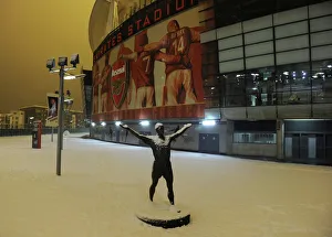 Arsenal's Winter Showdown at Snowy Emirates Stadium
