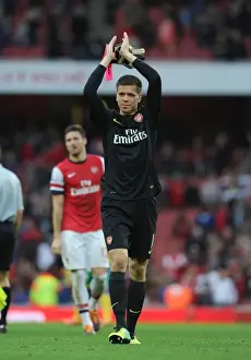Arsenal V Norwich City 2013-14 Prints: Arsenal's Wojciech Szczesny Celebrates with Fans after Arsenal v Norwich City Victory (2013-14)