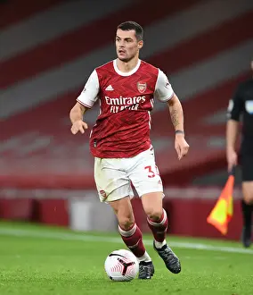 Arsenal's Xhaka in Action: Battle at Emirates Amidst Pandemic Restrictions - Arsenal vs. Leicester City (2020-21)