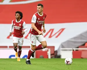 Arsenal's Xhaka in Action: Emirates Stadium Showdown Against Sheffield United (2020-21)