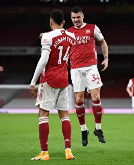 Arsenal's Xhaka and Aubameyang Celebrate First Goal in Empty Emirates Stadium Against Newcastle United (2021)