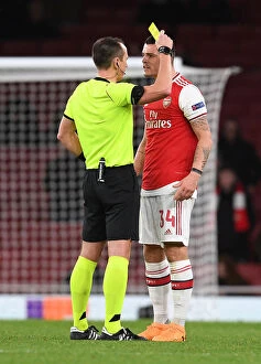 Images Dated 28th November 2019: Arsenal's Xhaka Booked in Europa League Clash Against Eintracht Frankfurt