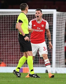 Images Dated 28th November 2019: Arsenal's Xhaka Booked in Europa League Match Against Eintracht Frankfurt
