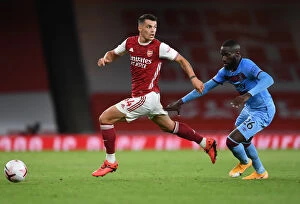 Images Dated 19th September 2020: Arsenal's Xhaka Clashes with West Ham's Masuaka in Premier League Showdown