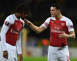 BATE Borisov V Arsenal 2018-19 Prints: Arsenal's Xhaka and Iwobi in Action against BATE Borisov in UEFA Europa League