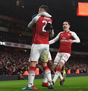 Images Dated 24th January 2018: Arsenal's Xhaka, Lacazette, and Bellerin Celebrate Goals in Carabao Cup Semi-Final vs Chelsea