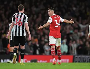 Arsenal V Newcastle United 2022-23 Prints: Arsenal's Xhaka and Longstaff in Deep Conversation During Arsenal v Newcastle Premier League Clash (2022-23)