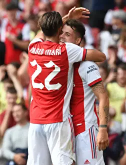 Arsenal V Chelsea - Pre Season Friendly 2021-22 Prints: Arsenal's Xhaka and Mari Celebrate Goal: Pre-Season Victory Over Chelsea at Emirates Stadium