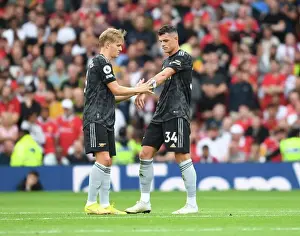 Manchester United V Arsenal 2022-23 Prints: Arsenal's Xhaka Passes Captaincy to Odegaard in Manchester United Clash (2022-23)