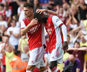 Arsenal V Chelsea - Pre Season Friendly 2021-22 Prints: Arsenal's Xhaka and Pepe Celebrate Goal: Arsenal vs. Chelsea Pre-Season Clash, 2021-22