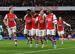 Arsenal's Xhaka, Saka, Odegaard, and Cedric Celebrate Lacazette's Goal Against Leicester City (2021-22)