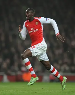 Arsenal V Borussia Dortmund 2014-15 Prints: Arsenal's Yaya Sanogo Faces Borussia Dortmund in the UEFA Champions League