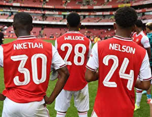 Arsenal's Young Stars: Nketiah, Willock, and Nelson Celebrate Emirates Cup Victory over Olympique Lyonnais