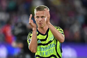 Images Dated 21st August 2023: Arsenal's Zinchenko Celebrates with Fans: Crystal Palace Victory in 2023-24 Premier League