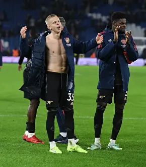 Arsenal's Zinchenko Celebrates Victory over Brighton with Fans