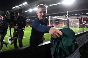 PSV Eindoven V Arsenal 2023-24 Prints: Arsenal's Zinchenko Delights Fan with Shirt Gift After Champions League Victory