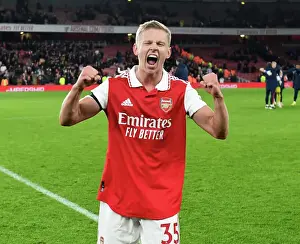 Arsenal's Zinchenko Leads Victory Celebrations Against West Ham in 2022-23 Premier League