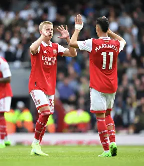 Arsenal's Zinchenko and Martinelli in Action against Tottenham in the 2022-23 Premier League