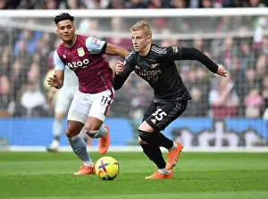 Arsenal's Zinchenko Outmaneuvers Villa's Watkins in Premier League Clash