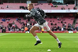Arsenal's Zinchenko Readies for Battle: Arsenal vs Brighton, 2023-24 Premier League