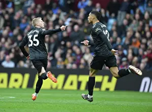 Arsenal's Zinchenko and Saliba: Celebrating a Goal Against Aston Villa (2022-23)
