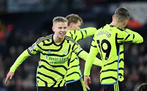 Arsenal's Zinchenko Shakes Hands with Trossard: Luton Town vs Arsenal, Premier League 2023-24
